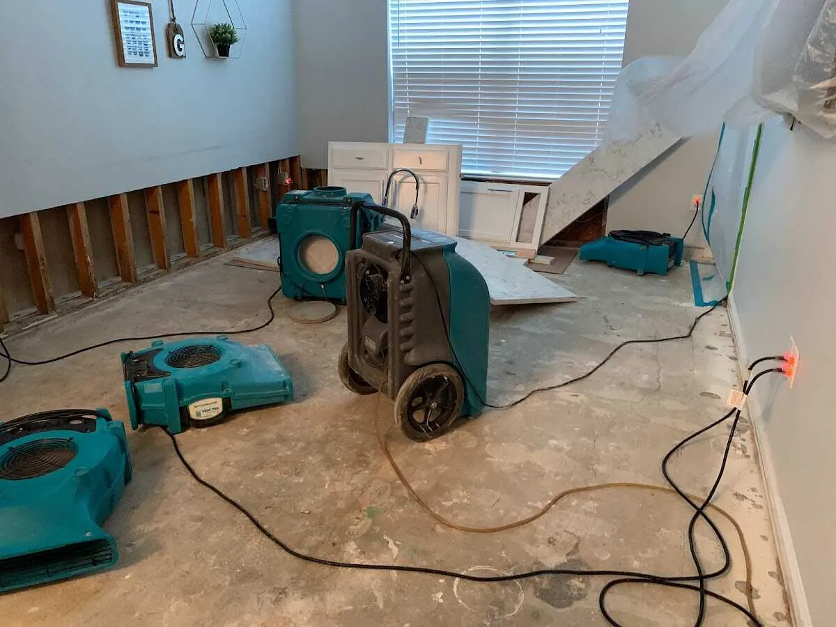 Dehumidifier in flood-cut room for Water Damage Restoration in North Kansas City